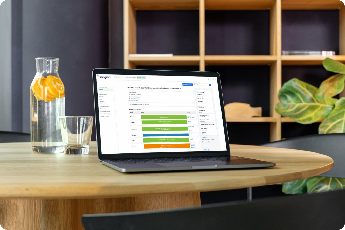 Streamline Grant Management on a laptop screen